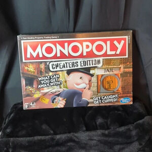 Monopoly Cheaters Edition. New In Box.